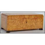 A stunning 1930's Art Deco birds eye maple Jewellery box / casket, fitted with a hinged lid