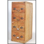 A good early 20th century upright Industrial panel wood 4 drawer filing cabinet. Of upright form