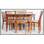 A good mid century / 1950's  dining table and chairs suite by Pete Hayward for Vanson. The extending