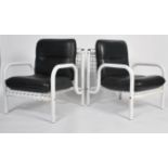 A good pair of French 1970's / 1980's designer armchairs of white tubular metal and cage work