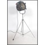 A good 20th century large theatre / cinema film spot light lamp on raised tripod having large