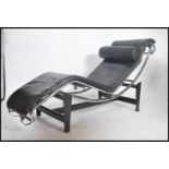 After Le Corbusier LC4 chaise lounge day bed with black leather upholstery and barrel cushion set