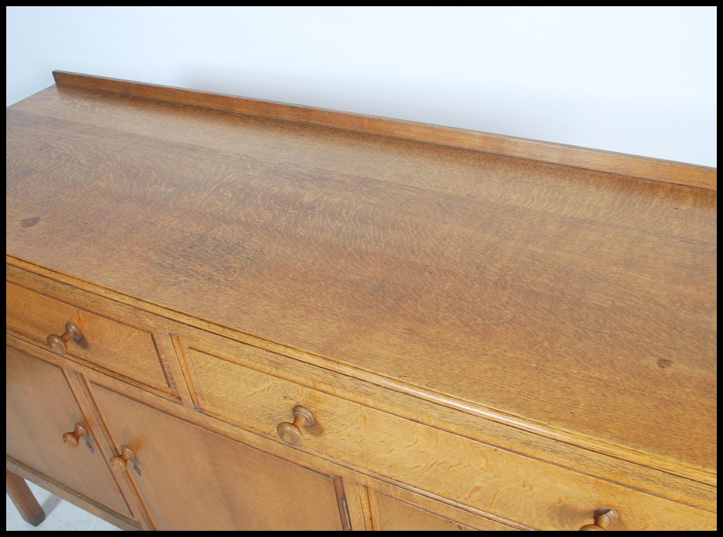 A Heal`s mid century oak sideboard, two long drawers (with Heal & Sons roundel to top drawer) - Image 6 of 7