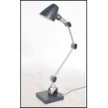 An original industrial factory anglepoise lamp by EDL. A multi adjustable arm with switch to base
