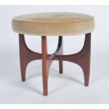 A retro 20th century teak wood circular G-Plan dressing table stool raised on teak wood x-cross base