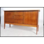 A good mid century / 1950's  sideboard by Pete Hayward for Vanson. The sideboard raised on tapered