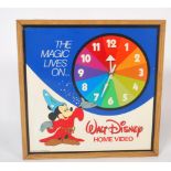 A vintage 1980's shop advertising point of sale clock advertising for Walt Disney home video, with