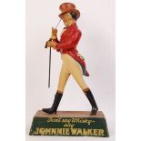 An original vintage retro shop counter point of sale advertising display statue for Johnnie Walker