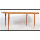 A 20th Century Danish extending table in beech rai