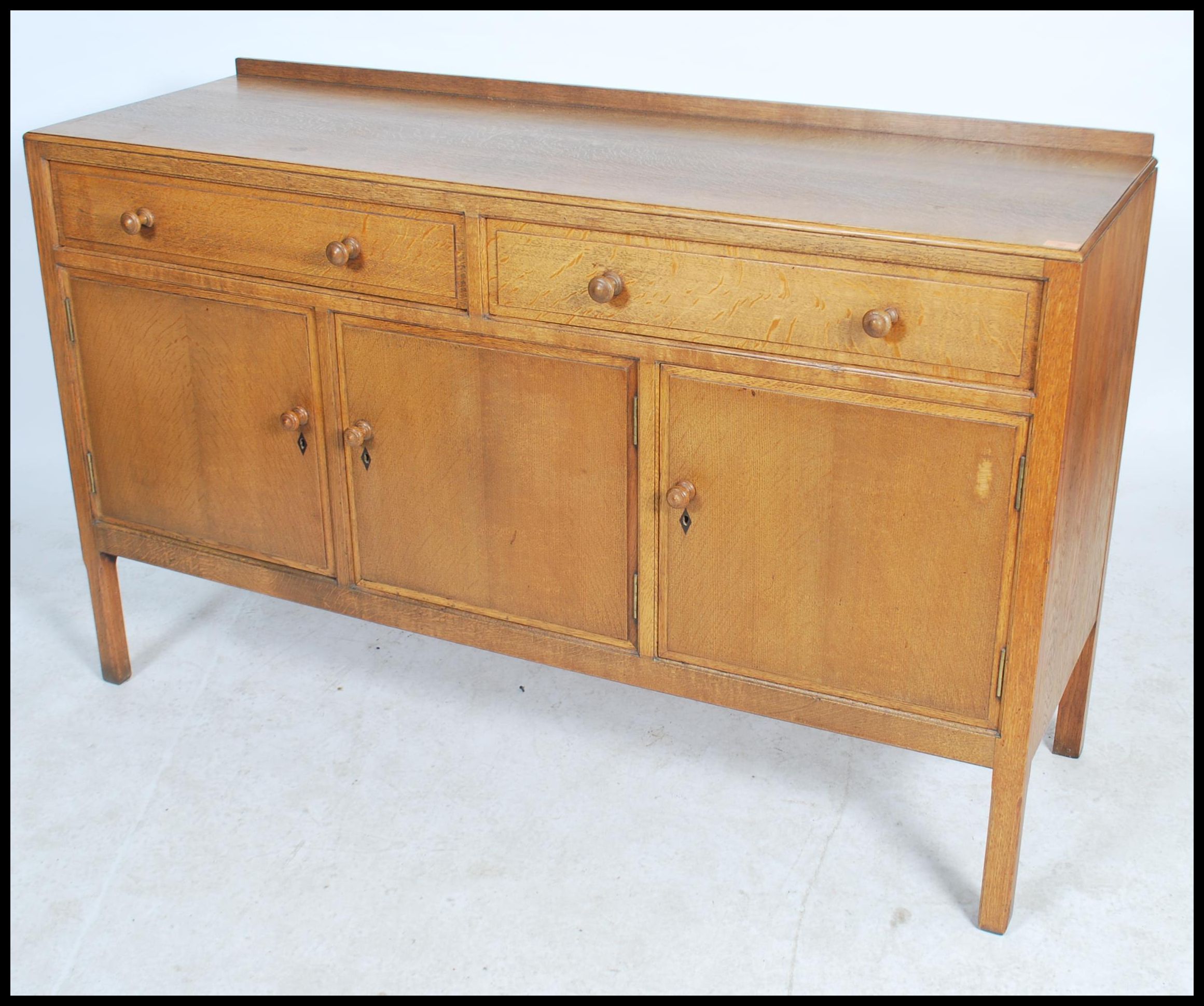 A Heal`s mid century oak sideboard, two long drawers (with Heal & Sons roundel to top drawer) - Image 2 of 7