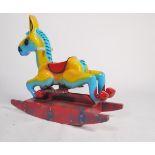 An original 1970's / 1980's fairground attraction ride horse of cast composite form with remains