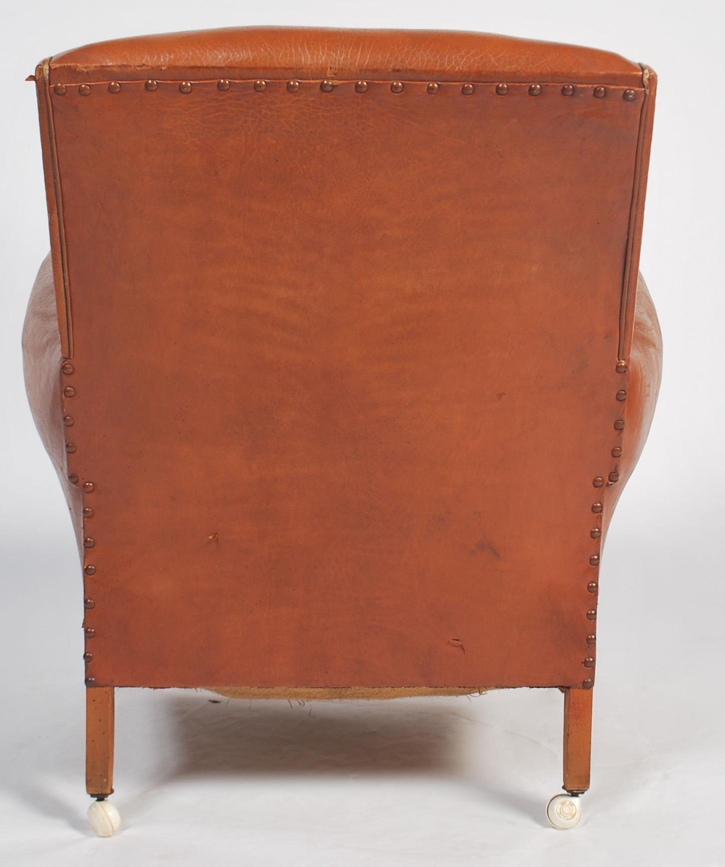 An exceptional 1930's Art Deco tan brown leather French club armchair being raised on leather - Image 5 of 5