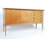 An original mid century Gordon Russell helix inspired walnut sideboard / dresser. Raised on