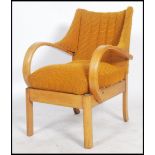 A vintage Art Deco bentwood wing back fireside armchair. Upholstered in a vibrant orange woolen