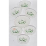 A collection of six vintage fish plates and matching serving plate by Phoenix ( Pyrex ) each milk