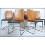 A set of 6 contemporary Calligaris 20th century Italian cantilever dining chairs having chrome