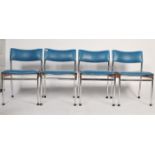 A set of 4 1970's retro teak wood and chrome dining chairs. Raised on tubular chrome legs with