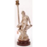 An early 20th century table lamp by Art Union of London, modelled as a cast mythological figure with