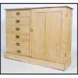 A stunning late 19th century / early 20th century bleached pine housekeepers cupboard / sideboard