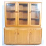 A good 20th century Ercol Windsor pattern dresser cabinet sideboard. The low sideboard on ball