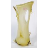 A large 20th century Murano glass Empoli vase of pierced form being handblown and in a stunning