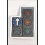 A large set of L-Shaped Industrial traffic lights complete with the blinker hoods and raised on tall