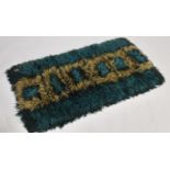 A stunning retro 1970's 20th century crochet floor rug, the crochet rug having a deep shag pile