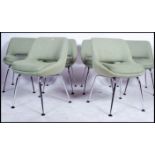 A set of 6 1970's chairs in the manner of Eero Saarinen ' executive chairs ' Each with tub frames