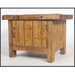 A fantastic vintage rustic butchers block on fitted base cabinet, solid wood block top with metal
