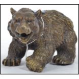 A vintage 20th century hollow cast bronze bear wit