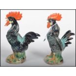A pair of hand painted 20th century Majolica cocke