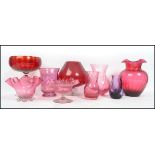 A collection of early 20th century cranberry glass