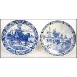 Two 20th century Delft ceramic wall hanging charge