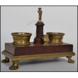 A 19th century Napoleon inspired French desk stand