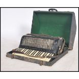 Musical Instruments. A cased vintage early 20th ce