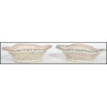 A pair of 19th century ceramic ribbon pin dishes,