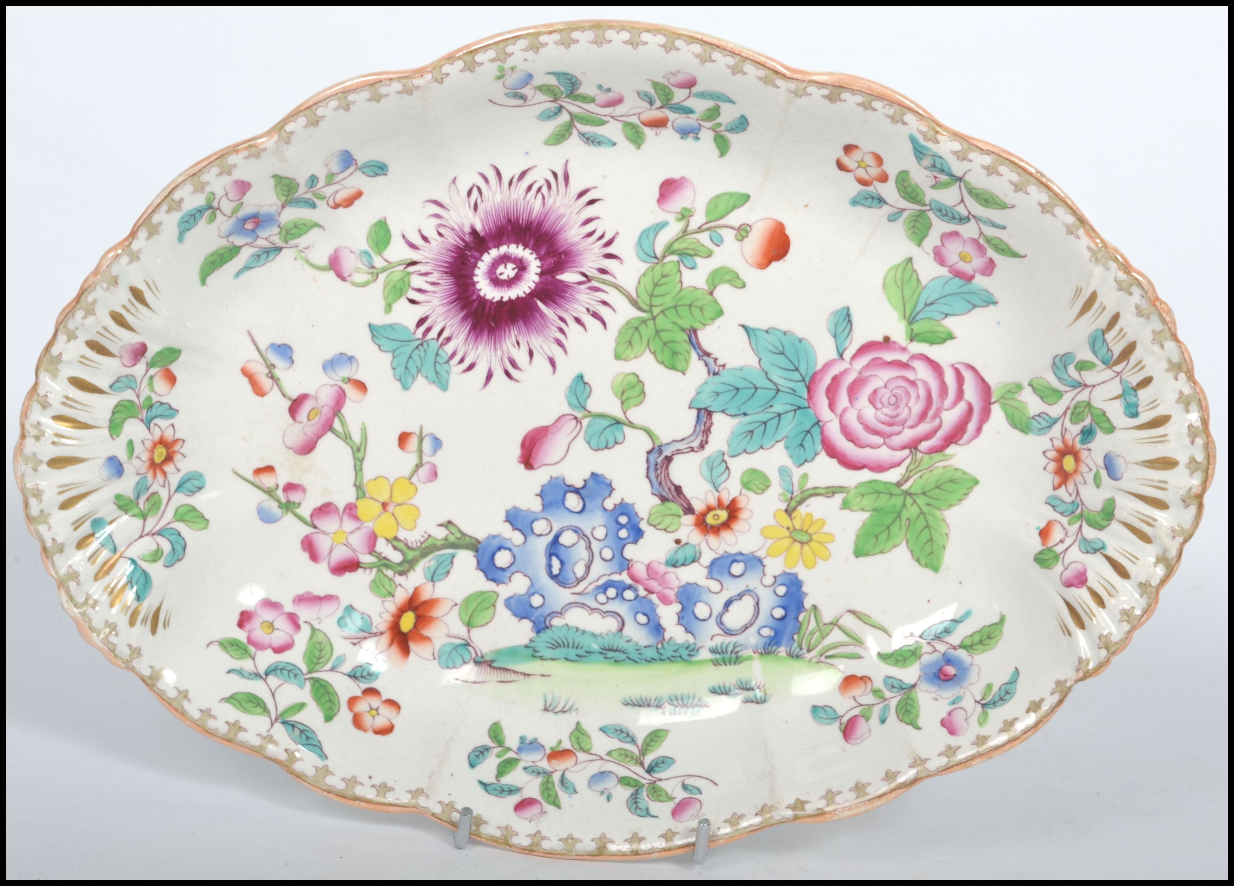 A 19th century ceramic Chinoiserie scalloped dish