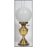 A vintage 20th century duplex brass oil lamp by S.