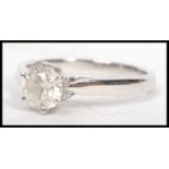 A good 18ct white gold and diamond single stone la