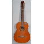 A vintage Dulcet classic six string acoustic guita