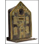An 19th century worked metal and brass money box i