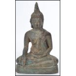 A 19th century hollow cast bronze Buddha moulded i