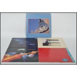 A group of five long play LP vinyl records by Dire