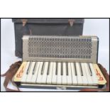 Musical Instruments. A cased vintage 20th century