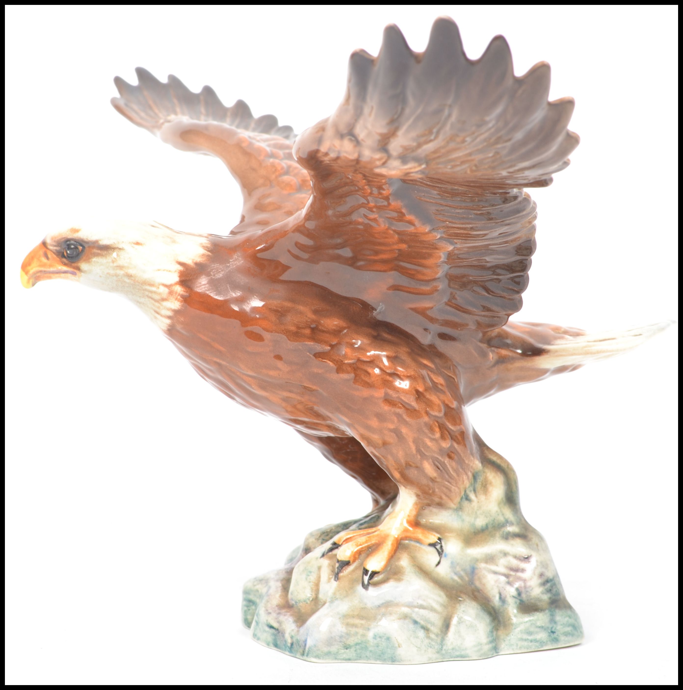 A Beswick - large early bird figure ' Bald Eagle ' Model 1018, of an eagle with it's wings at full - Image 2 of 5