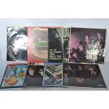 A collection of vinyl long play LP record albums to include The Beatles and The Rolling Stones -