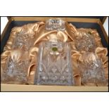 A cased unused Lead Crystal decanter and tumbler set, within original presentation box, by RCR /