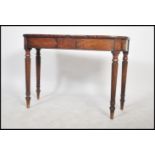 An 18th / 19th century Georgian flame mahogany side / console table being raised on reeded table