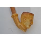 A early 20th century clay pipe with the bowl modeled as Albert of Belgium dating 1914 with