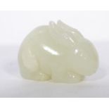 A 20th century  white jade carving of a rabbit, hunched on all fours measuring 4.5cms